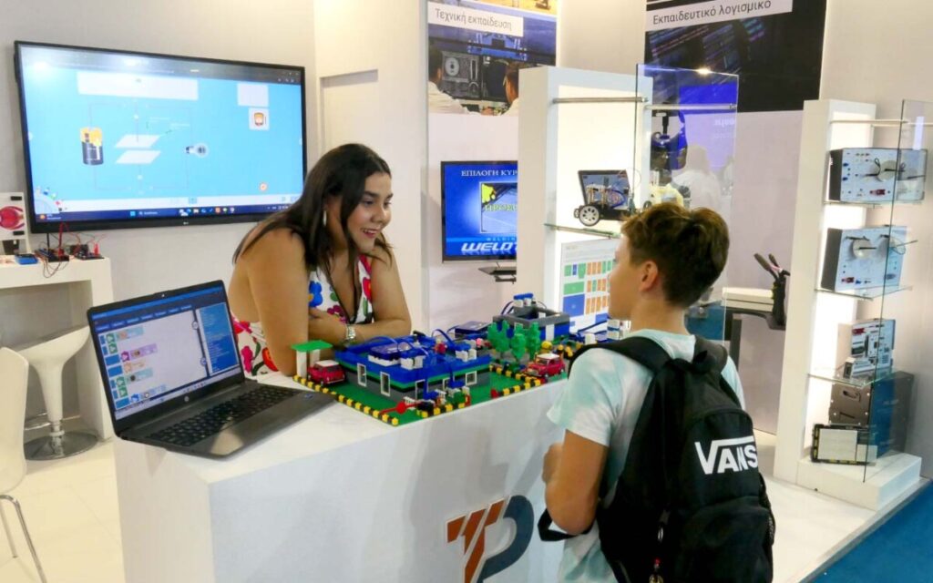 A student is briefed on the Polytech SMART:Blox STEM physical computing systems