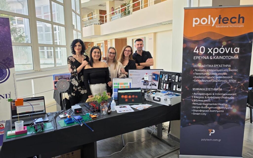 group of people displaying educational technology products